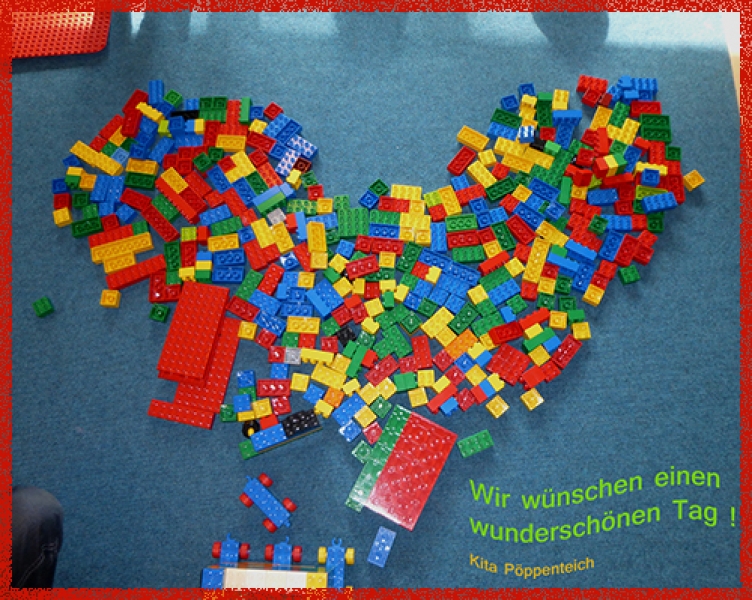 Ein aus Lego gelegtes "Willkommen-Herz".